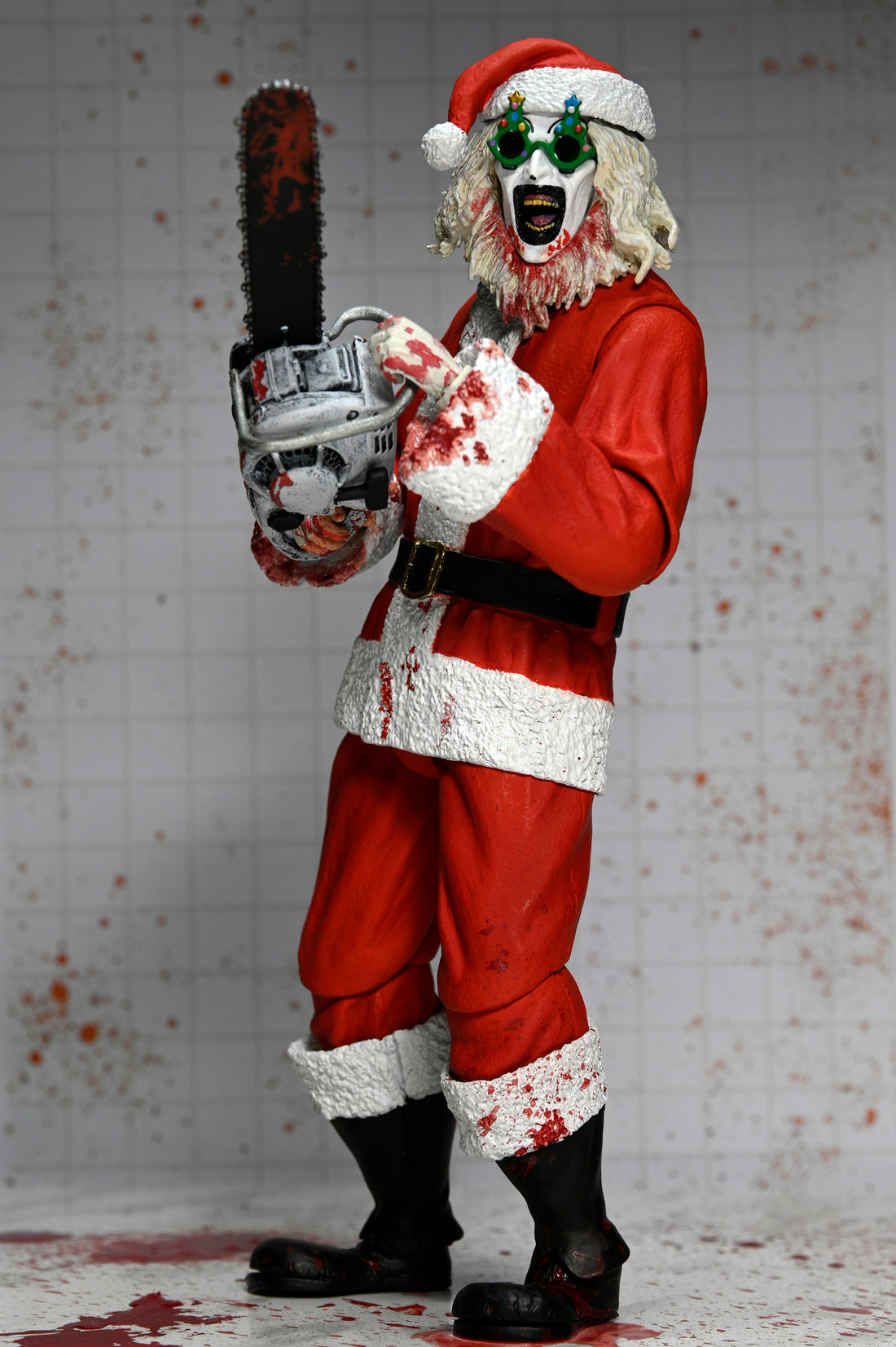 Terrifier 3 - Ultimate Santa Suit Art the Clown (Bloody Version) 7" Scale Action Figure on the NECA Store