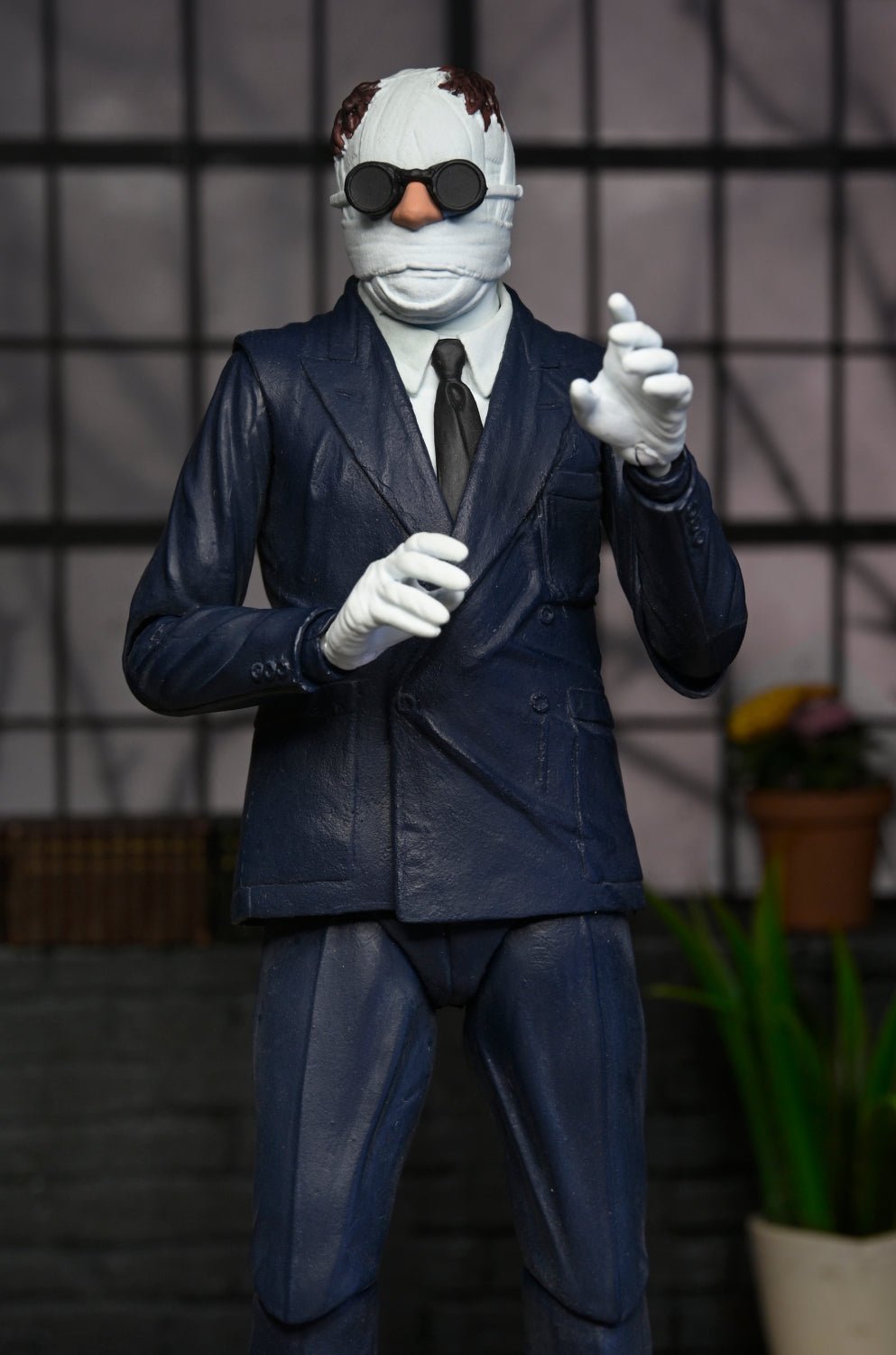 Universal Monsters – Glow-in-the-Dark Retro Invisible Man 7” Scale Action Figure (2024 Con Exclusive) - NECA