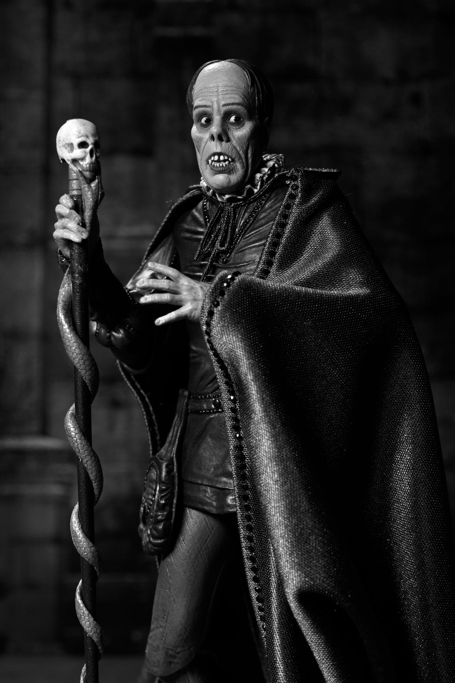 The Phantom of the Opera (1925) - Phantom of the Opera "Masque of the Red Death" 7" Scale Action Figure (Black &amp; White) on the NECA Store