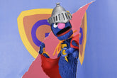 Sesame Street - Ultimate Super Grover 7" Scale Action Figure on the NECA Store