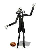 The Nightmare Before Christmas Jack Skellington with Pumpkin 9” Articulated Figure pointing up with pumpkin 
