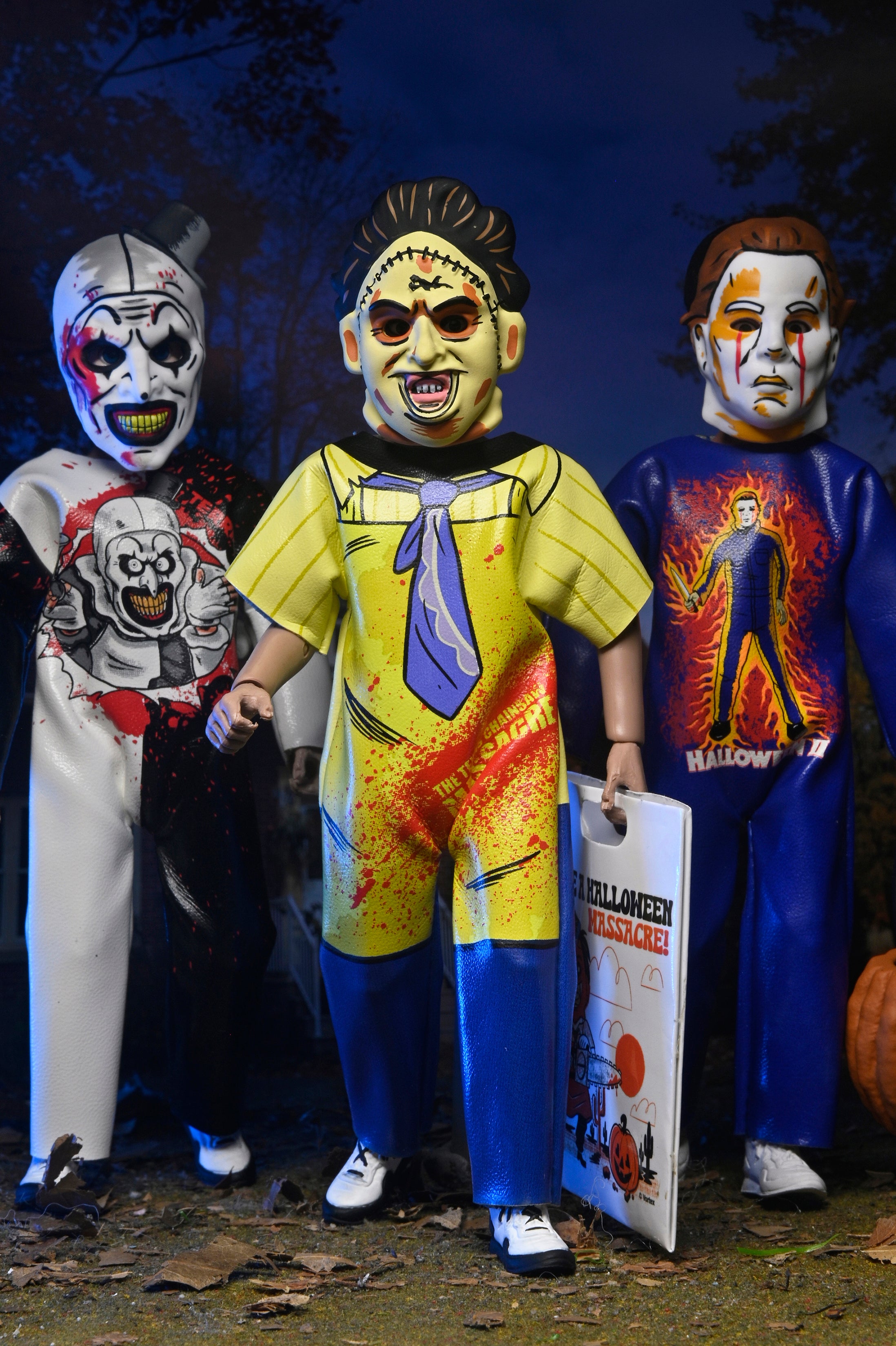 Ben Cooper Costume Kids Collection - Series 9 Costumed Action Figure Bundle (Leatherface, Michael Myers, Billy the Puppet, Pennywise & Art the Clown) - NECA - Shown:  Art the Clown, Leatherface, and Michael Myers