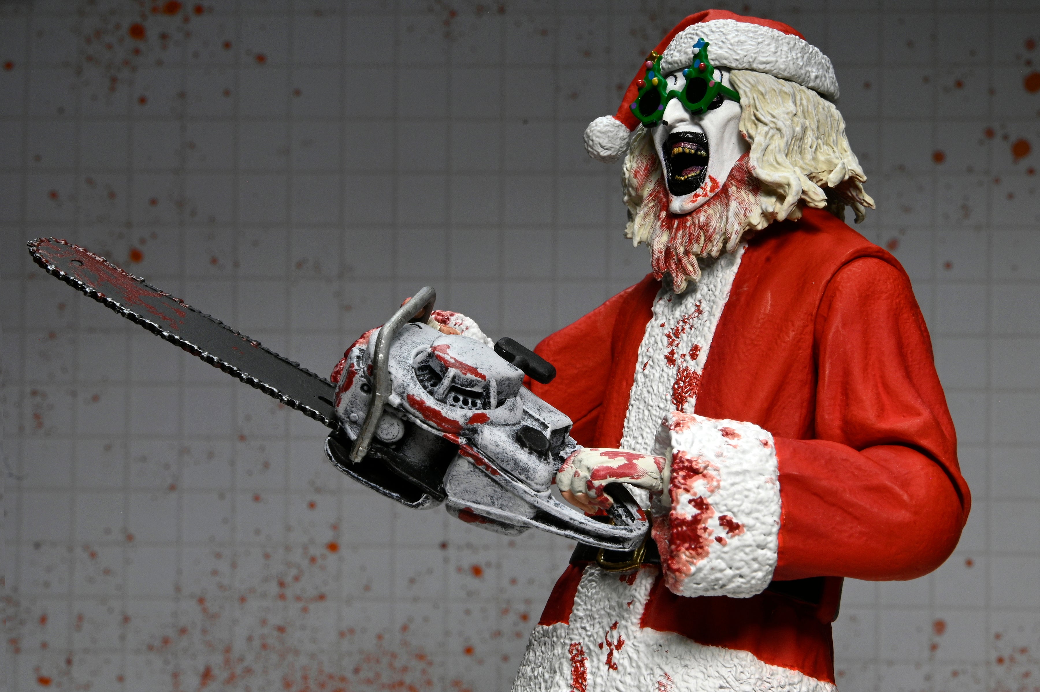 Terrifier 3 - Ultimate Santa Suit Art the Clown (Bloody Version) 7" Scale Action Figure on the NECA Store