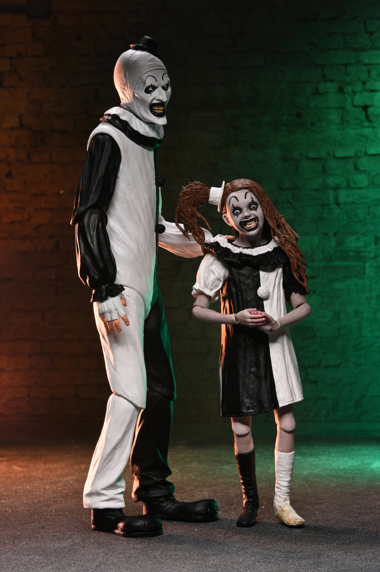 Terrifier 2 - Ultimate Art the Clown and The Little Pale Girl 7" Scale Action Figure 2-Pack on the NECA Store