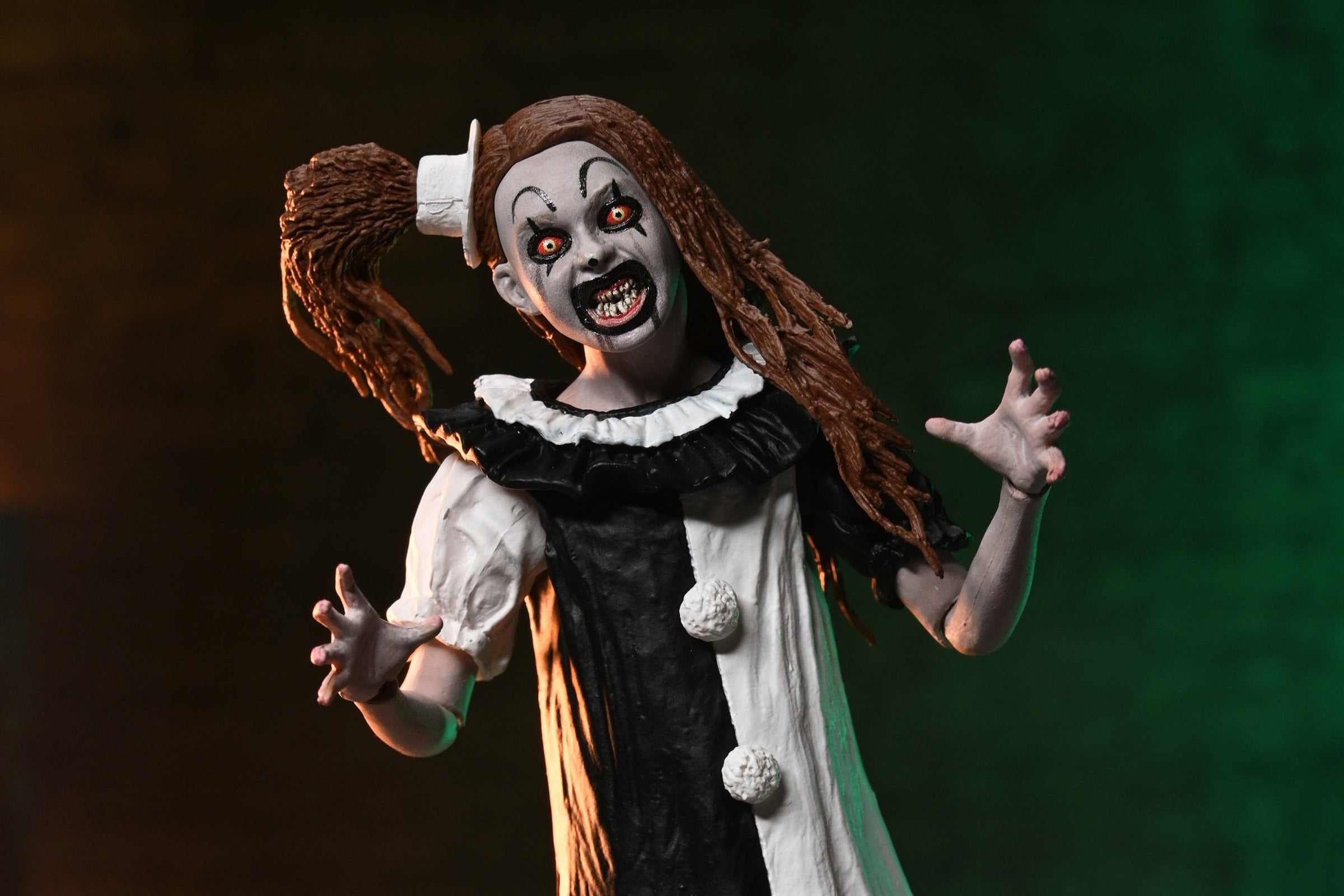 Terrifier 2 - Ultimate Art the Clown and The Little Pale Girl 7" Scale Action Figure 2-Pack on the NECA Store
