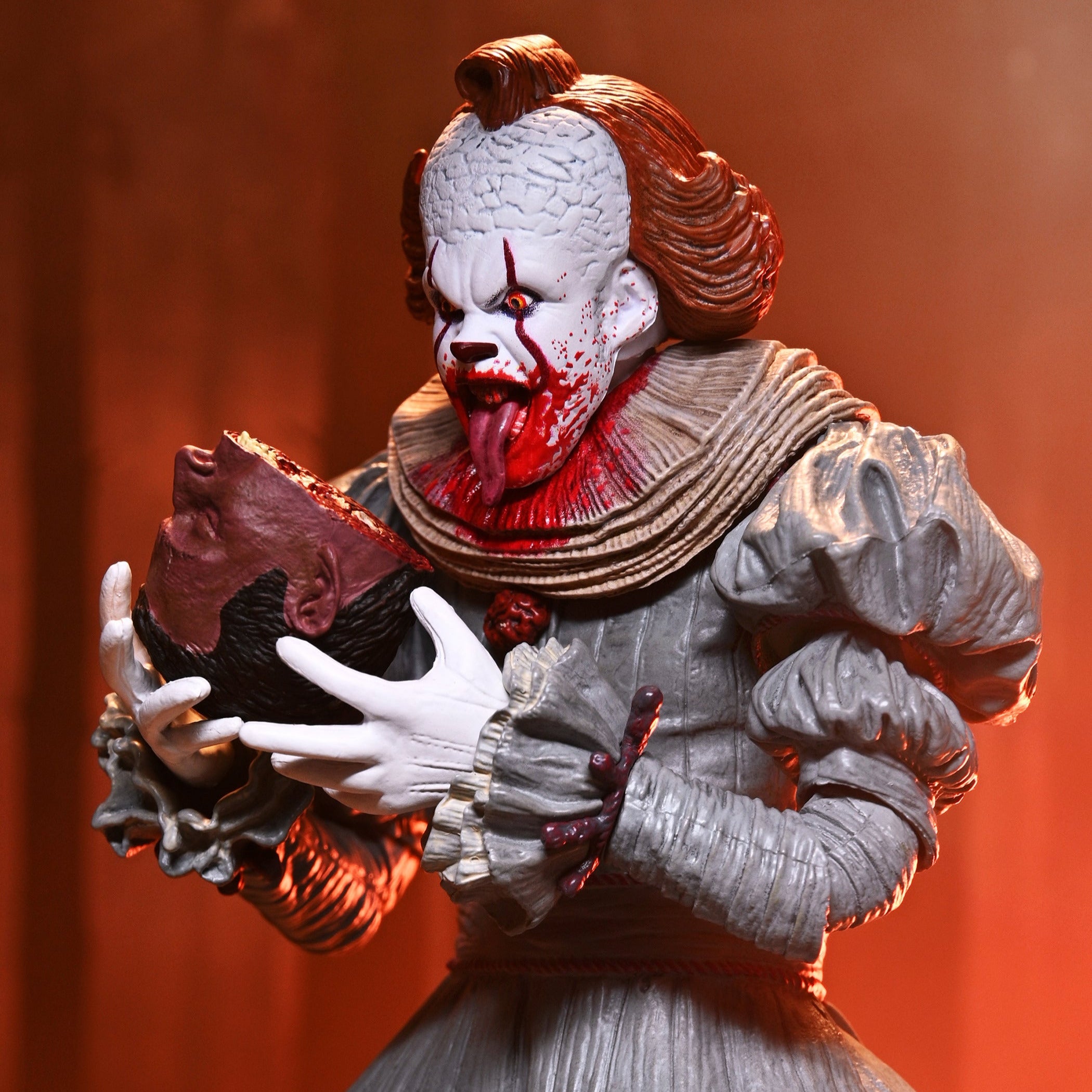 IT: Welcome to Derry - Ultimate Pennywise 7" Scale Action Figure - NECA