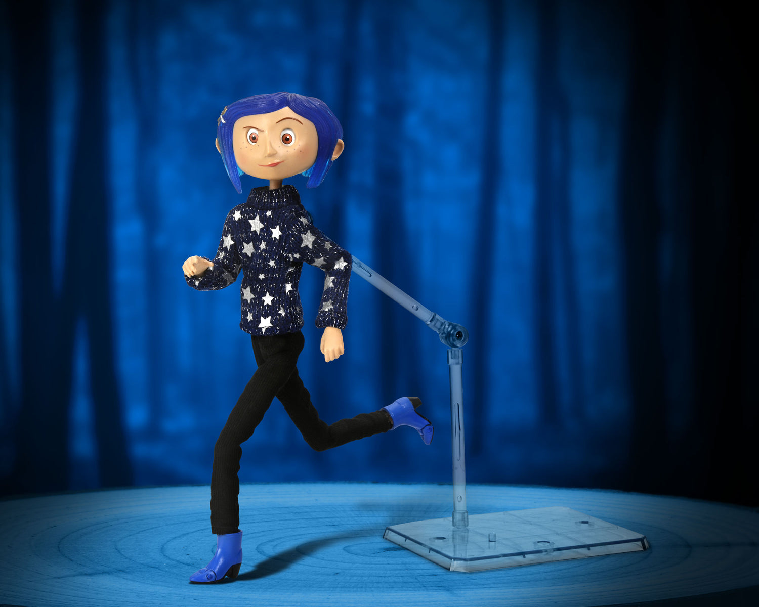 Coraline in Star Sweater 7” Articulated Figure with stylized background