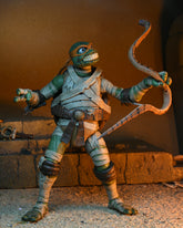 Universal Monsters x Teenage Mutant Ninja Turtles - Michelangelo as The Mummy 7” Scale Action Figure - NECA