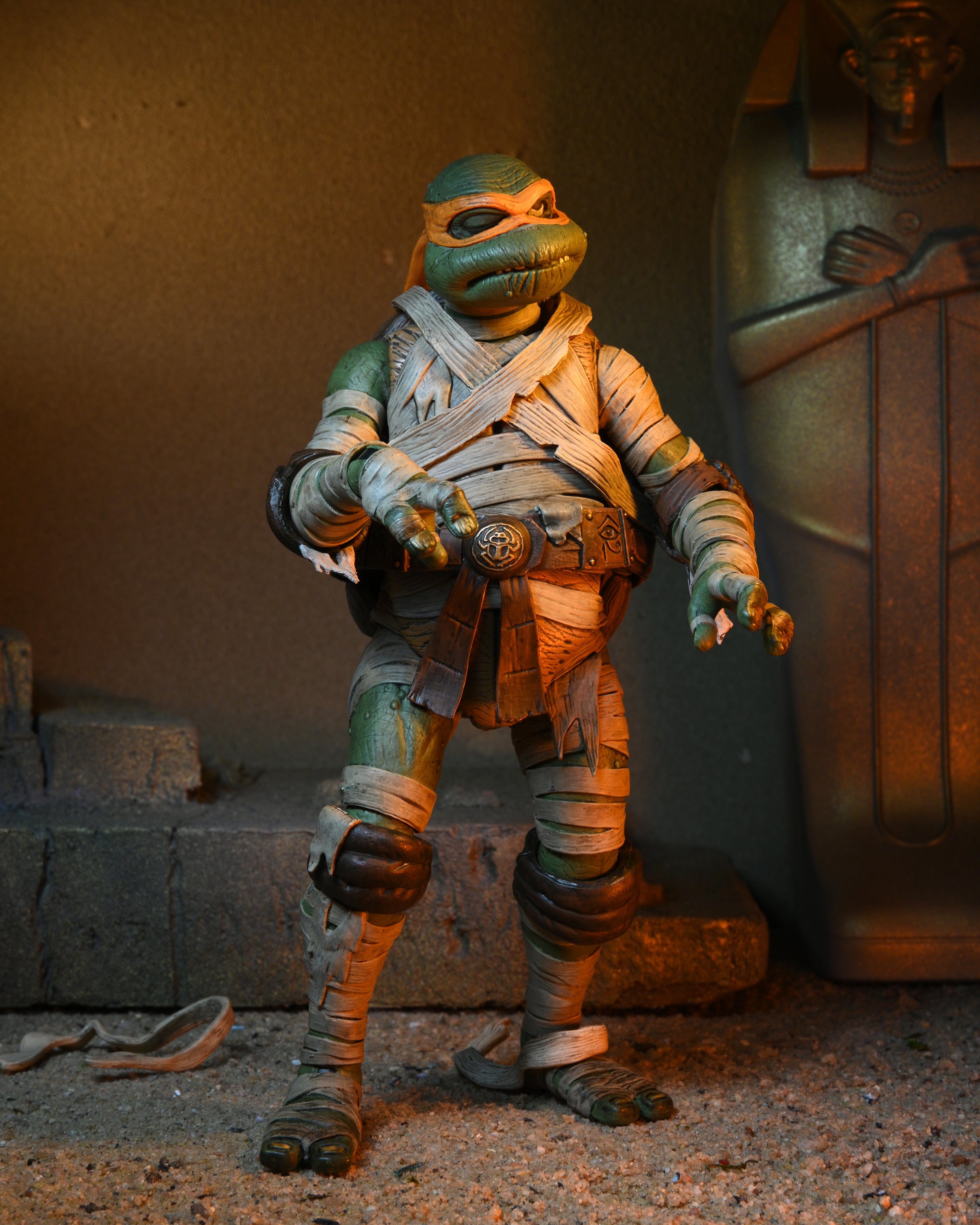 Universal Monsters x Teenage Mutant Ninja Turtles - Michelangelo as The Mummy 7” Scale Action Figure - NECA