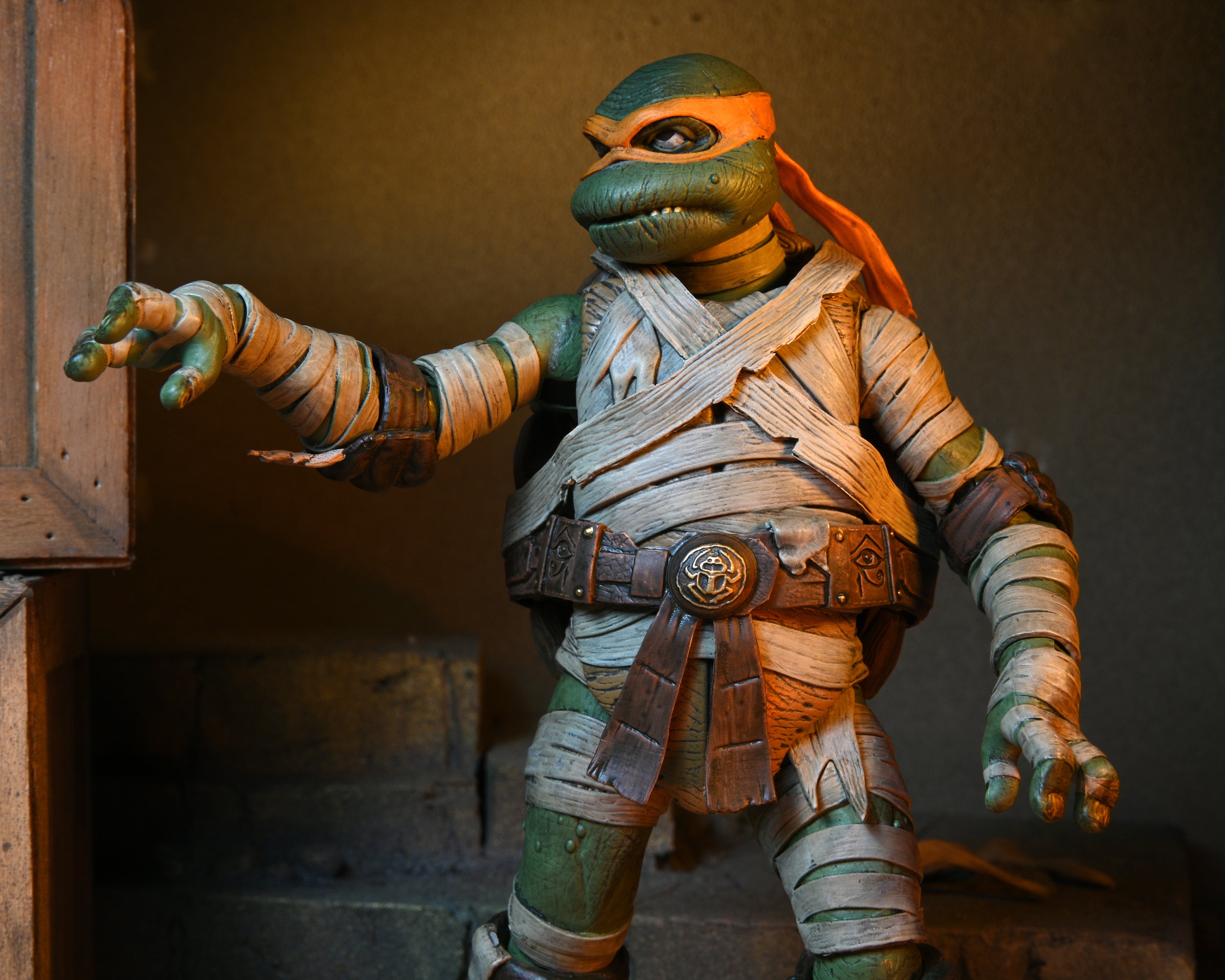 Universal Monsters x Teenage Mutant Ninja Turtles - Michelangelo as The Mummy 7” Scale Action Figure - NECA