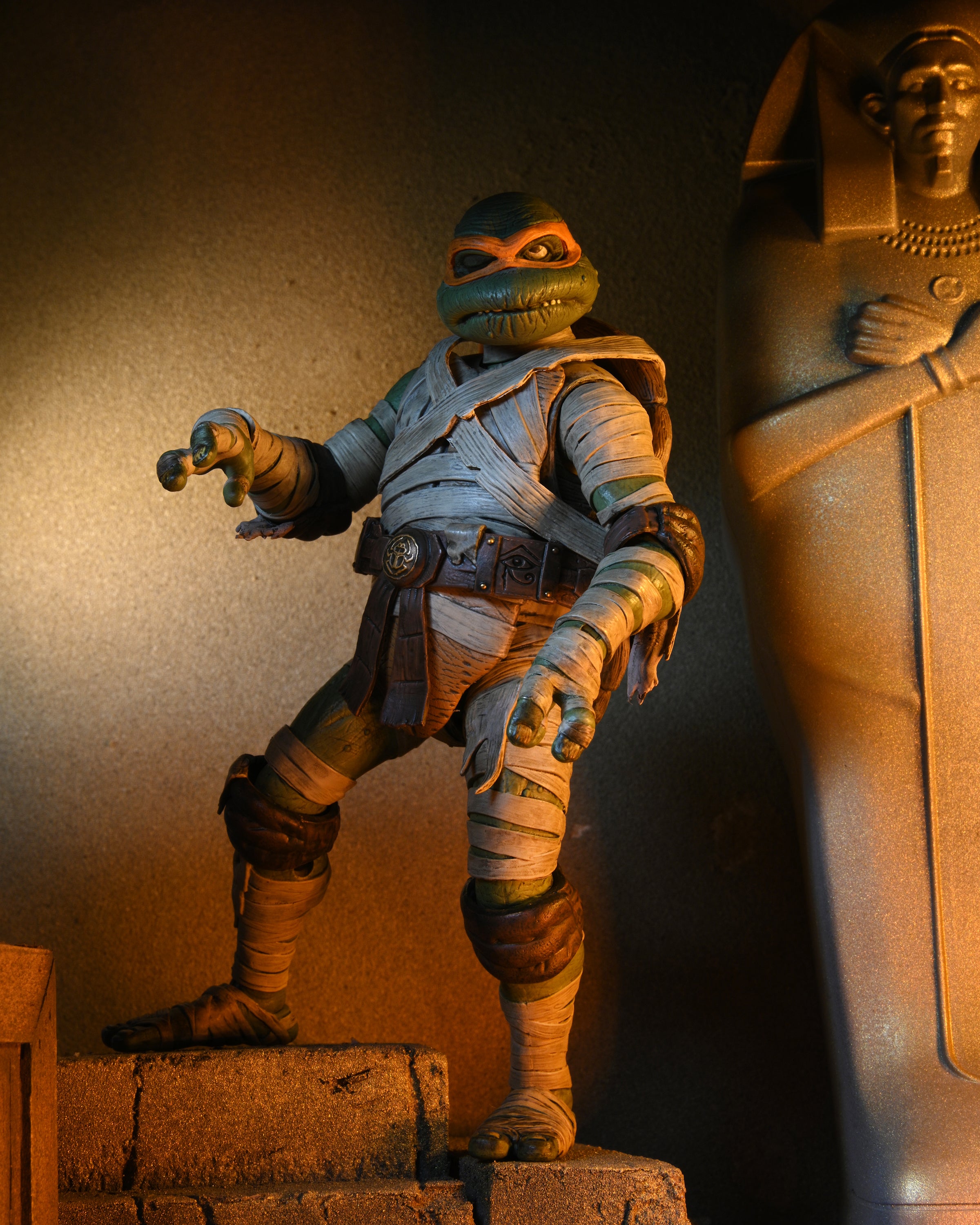 Universal Monsters x Teenage Mutant Ninja Turtles - Michelangelo as The Mummy 7” Scale Action Figure - NECA