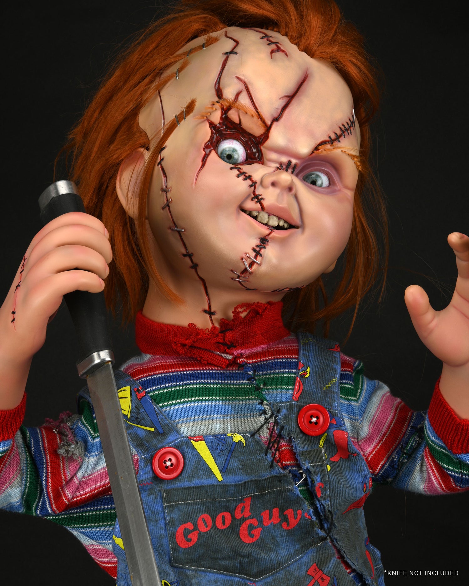 Scary Chucky holding a knife