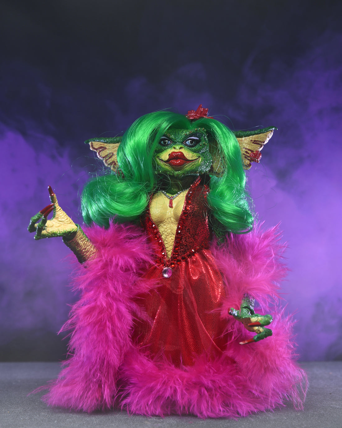 Gremlins 2 Ultimate Showgirl Greta 7&quot; Scale Action Figure by NECA wearing red gown and pink feather boa